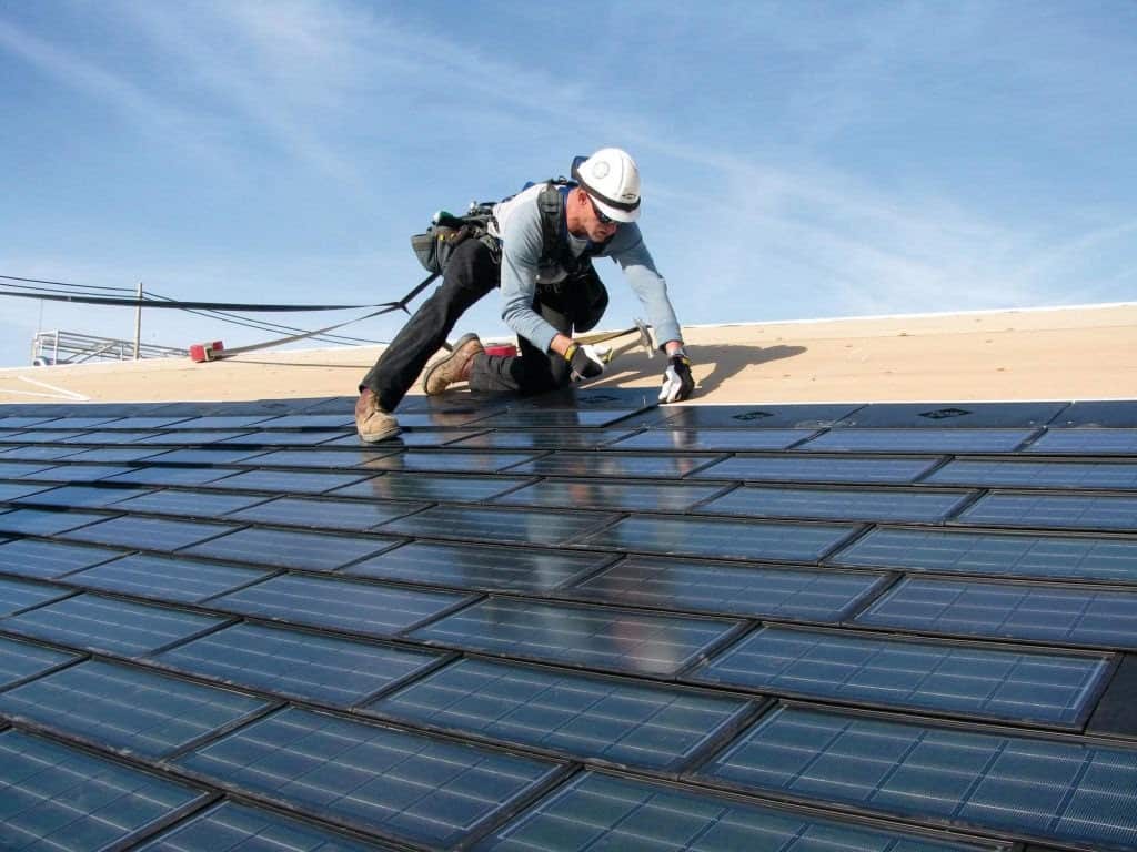 Man working on a roof - Armstrong Roof Repair Services.